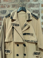 Load image into Gallery viewer, Chic modern trench coat. Tan and black trench coat. Hand painted luxe coat. Fit and flare artsy great quality. Wearable art, timeless, and warm.